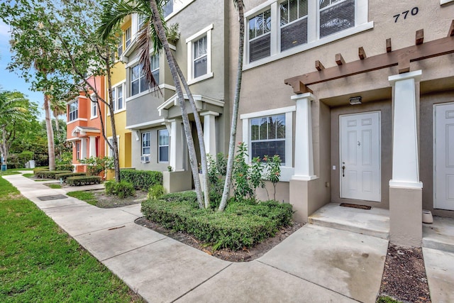 770 Millbrae 4 Ct Unit 4, West Palm Beach, FL 33401 - doorway to property with stucco siding