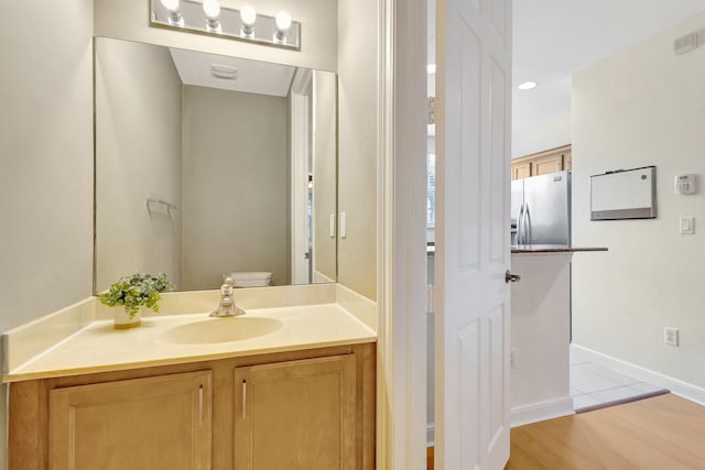 770 Millbrae 4 Ct Unit 4, West Palm Beach, FL 33401 - bathroom featuring vanity and baseboards