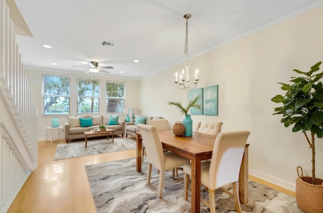 770 Millbrae 4 Ct Unit 4, West Palm Beach, FL 33401 - dining area featuring light wood-style flooring, ornamental molding, recessed lighting, a ceiling fan, and stairs
