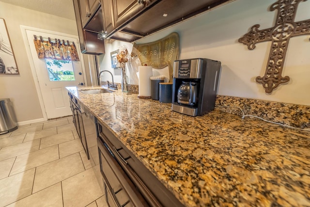 1450 SW 28th St, Okeechobee, FL 34974 - kitchen featuring stone countertops and light tile patterned flooring