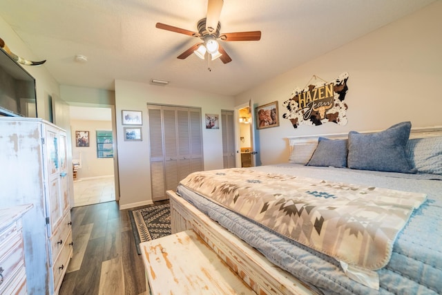 1450 SW 28th St, Okeechobee, FL 34974 - bedroom with dark wood-style floors, a closet, and a ceiling fan