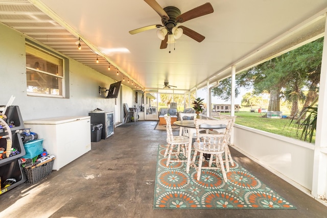 1450 SW 28th St, Okeechobee, FL 34974 - sunroom with ceiling fan and outdoor dining area