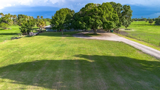 1450 SW 28th St, Okeechobee, FL 34974 - view of yard featuring driveway and a view of countryside
