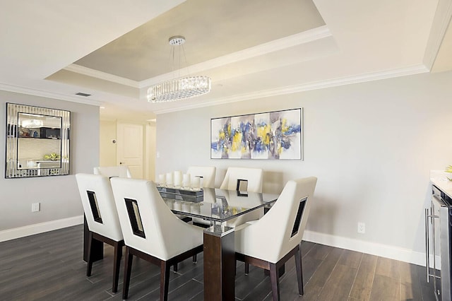 2001 N Ocean Blvd Unit 1804, Boca Raton, FL 33431 - dining room featuring a raised ceiling, a chandelier, dark wood finished floors, and crown molding