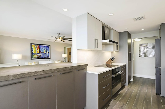 2001 N Ocean Blvd Unit 1804, Boca Raton, FL 33431 - kitchen with wall chimney range hood, black appliances, modern cabinets, ceiling fan, and recessed lighting