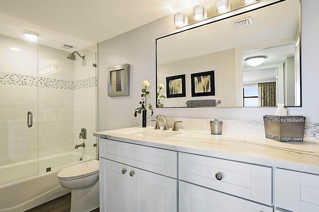 2001 N Ocean Blvd Unit 1804, Boca Raton, FL 33431 - full bathroom featuring vanity, shower / bath combination with glass door, and wood finished floors