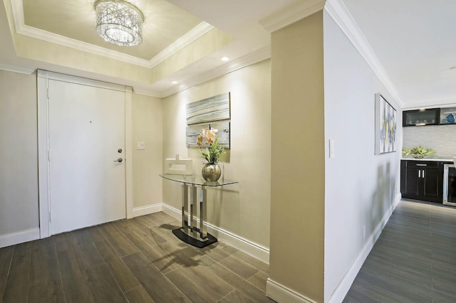 2001 N Ocean Blvd Unit 1804, Boca Raton, FL 33431 - foyer entrance featuring dark wood-style flooring, crown molding, and recessed lighting