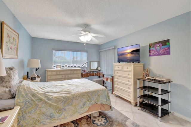 15401 Pembridge Ave Unit 9, Delray Beach, FL 33484 - bedroom featuring light tile patterned flooring and a ceiling fan
