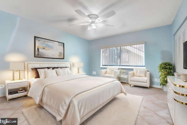 15401 Pembridge Ave Unit 9, Delray Beach, FL 33484 - bedroom featuring light tile patterned floors and a ceiling fan