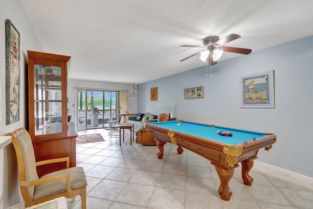 15401 Pembridge Ave Unit 9, Delray Beach, FL 33484 - recreation room featuring a textured ceiling, a ceiling fan, billiards table, and tile patterned floors