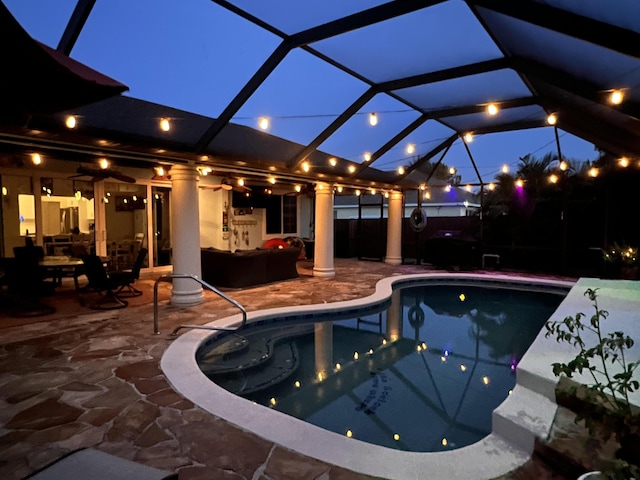 2990 SW Ventura St, Port Saint Lucie, FL 34953 - swimming pool with a patio, glass enclosure, and outdoor lounge area