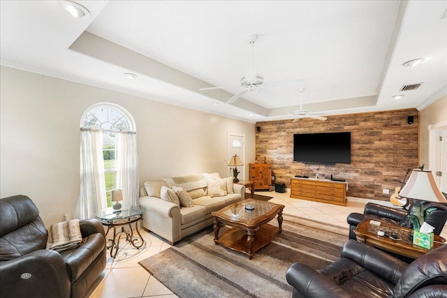 2990 SW Ventura St, Port Saint Lucie, FL 34953 - living area with a raised ceiling, light tile patterned flooring, and ceiling fan