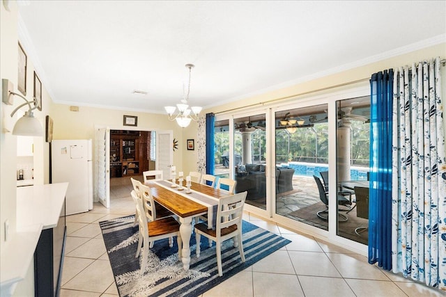 2990 SW Ventura St, Port Saint Lucie, FL 34953 - dining room with crown molding, light tile patterned floors, and a chandelier