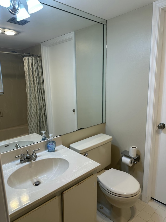 5917 Via Vermilya Unit 306, Lake Worth, FL 33462 - bathroom featuring vanity, tile patterned floors, and a shower with shower curtain