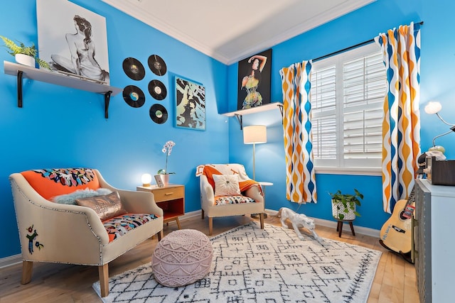 231 Caravelle Dr, Jupiter, FL 33458 - sitting room with crown molding and wood finished floors