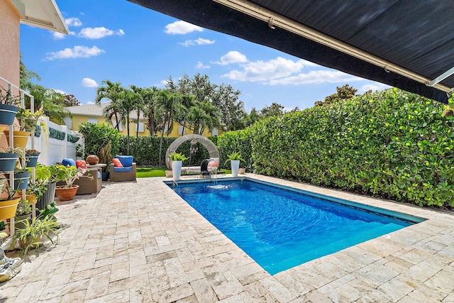 231 Caravelle Dr, Jupiter, FL 33458 - view of pool featuring a patio area and a fenced backyard