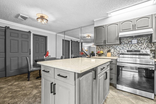 22180 Boca Rancho Dr Unit B, Boca Raton, FL 33428 - kitchen with electric stove, under cabinet range hood, gray cabinets, a textured ceiling, and a barn door