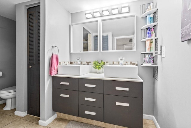 22180 Boca Rancho Dr Unit B, Boca Raton, FL 33428 - bathroom featuring vanity, tile patterned flooring, and a closet