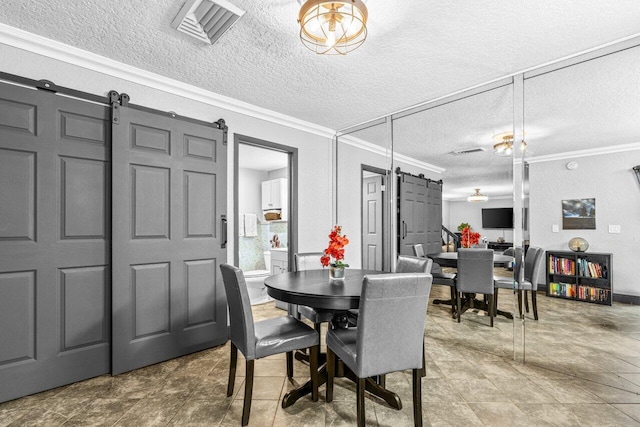 22180 Boca Rancho Dr Unit B, Boca Raton, FL 33428 - dining room featuring a barn door, ornamental molding, and a textured ceiling