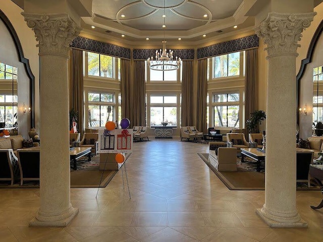 9916 E Tallyrand Dr, Lake Worth, FL 33467 - building lobby featuring a high ceiling and crown molding