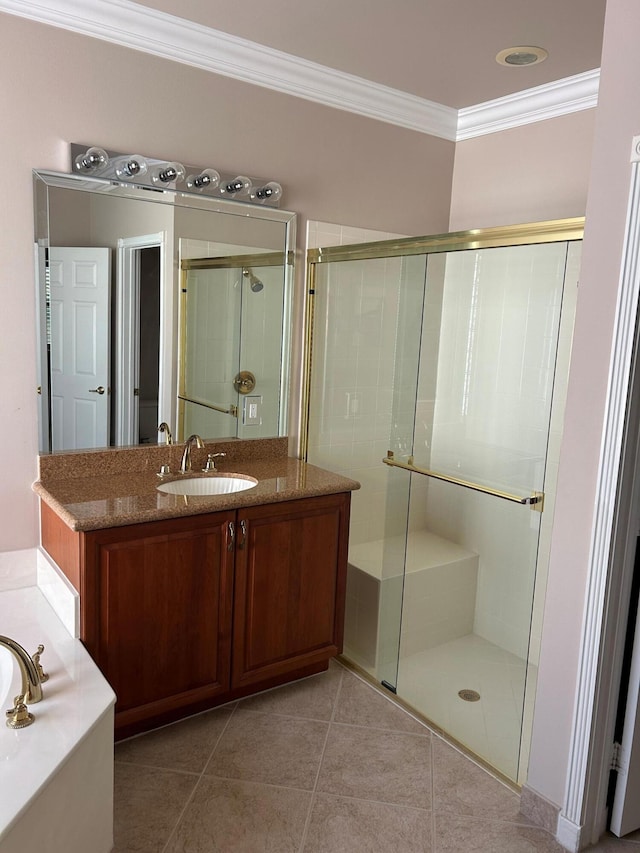 9916 E Tallyrand Dr, Lake Worth, FL 33467 - bathroom featuring ornamental molding, a shower stall, vanity, tile patterned flooring, and a garden tub