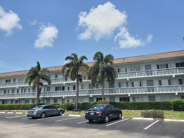 2200 Springdale Blvd Unit 306, Palm Springs, FL 33461 - view of apartment building / complex with uncovered parking