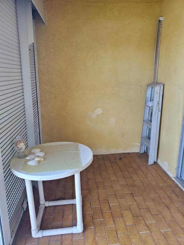 2200 Springdale Blvd Unit 306, Palm Springs, FL 33461 - dining area featuring brick floors