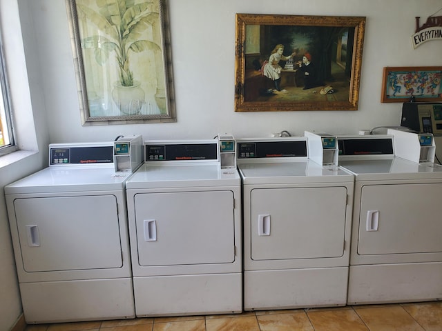 2200 Springdale Blvd Unit 306, Palm Springs, FL 33461 - community laundry featuring washer and dryer and light tile patterned flooring