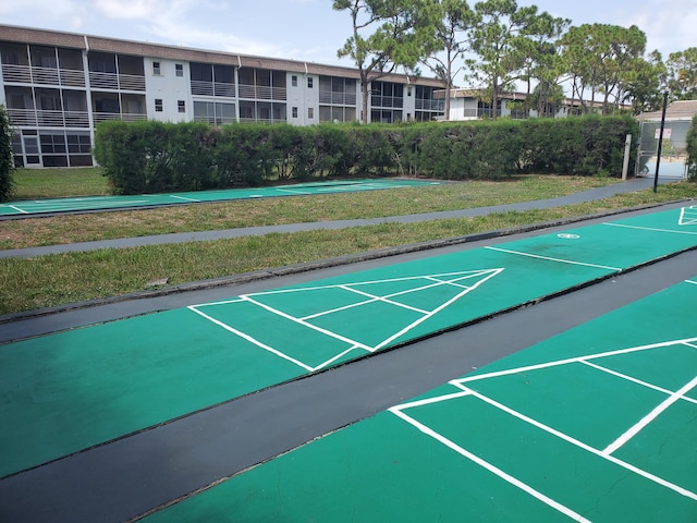 2200 Springdale Blvd Unit 306, Palm Springs, FL 33461 - view of home's community featuring shuffleboard and a lawn