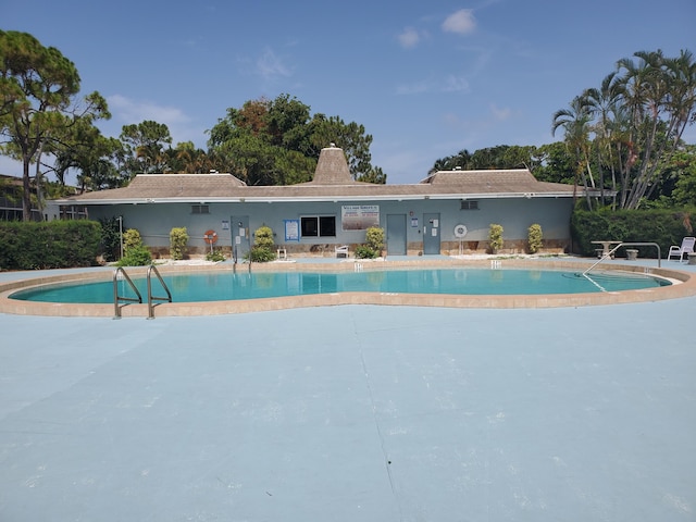 2200 Springdale Blvd Unit 306, Palm Springs, FL 33461 - community pool featuring a patio