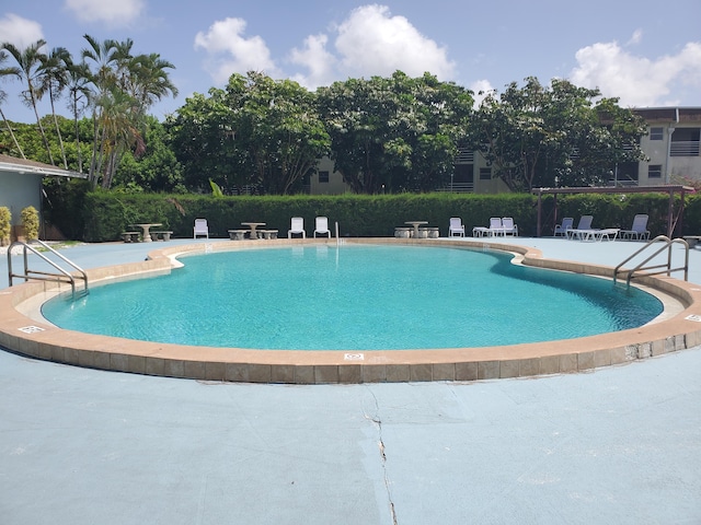 2200 Springdale Blvd Unit 306, Palm Springs, FL 33461 - community pool with a patio area