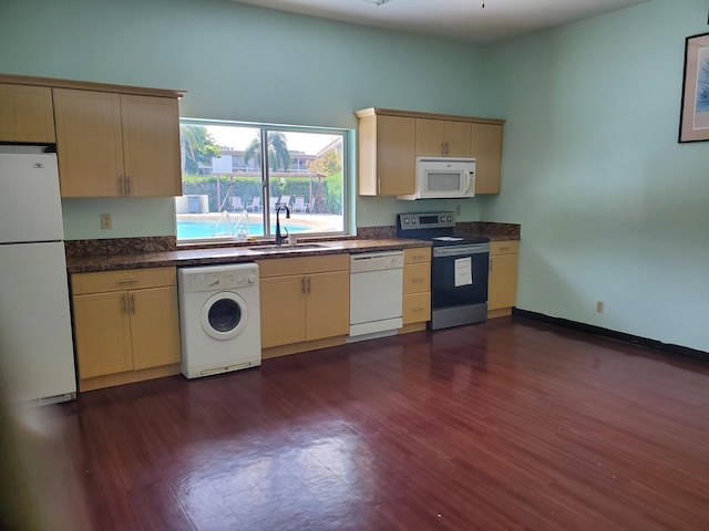 2200 Springdale Blvd Unit 306, Palm Springs, FL 33461 - kitchen featuring white appliances, washer / clothes dryer, cream cabinetry, and dark wood-style floors