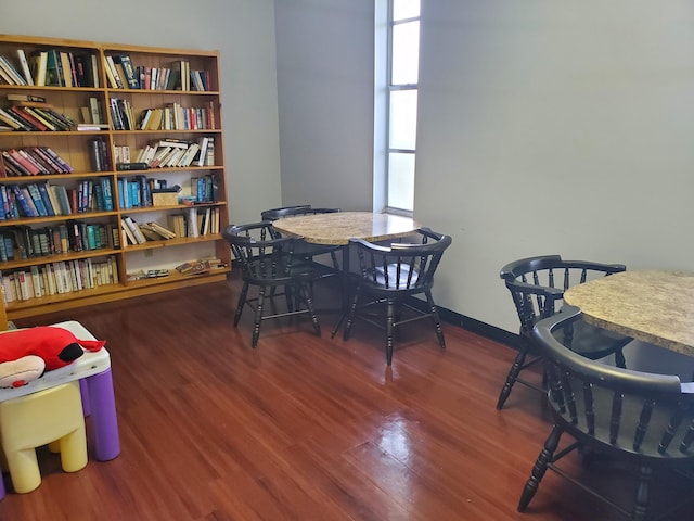2200 Springdale Blvd Unit 306, Palm Springs, FL 33461 - dining space featuring wood finished floors and baseboards