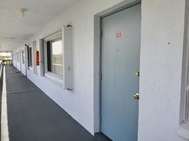 2200 Springdale Blvd Unit 306, Palm Springs, FL 33461 - doorway to property featuring stucco siding