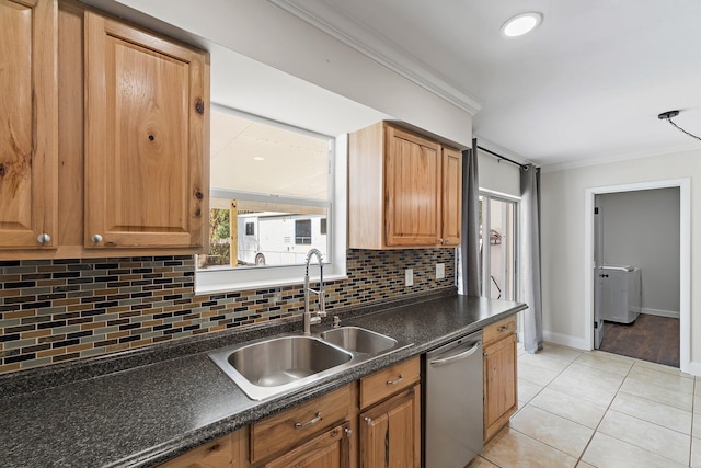 1008 Mohawk St, Jupiter, FL 33458 - kitchen featuring stainless steel dishwasher, dark countertops, crown molding, decorative backsplash, and light tile patterned floors