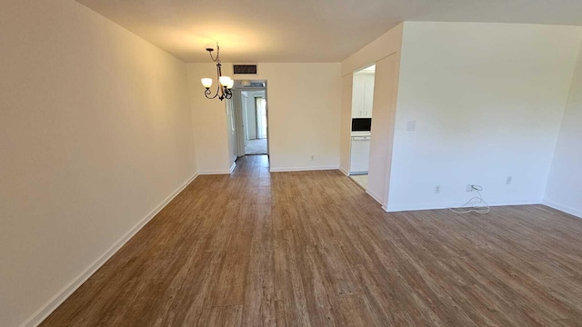 2905 Victoria Pl Unit D3, Coconut Creek, FL 33066 - unfurnished dining area with a chandelier and dark wood finished floors