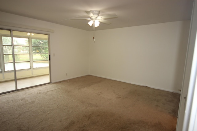 2905 Victoria Pl Unit D3, Coconut Creek, FL 33066 - empty room featuring carpet and ceiling fan