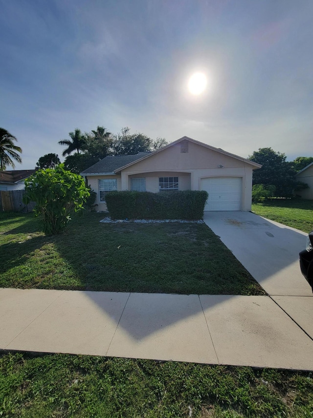 1355 Denlow Ln, Royal Palm Beach, FL 33411 - ranch-style house with concrete driveway and a garage