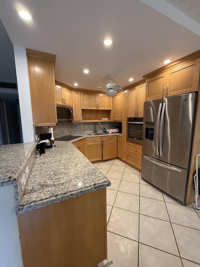 1046 Wolverton C, Boca Raton, FL 33434 - kitchen featuring stainless steel appliances, a ceiling fan, light tile patterned floors, tasteful backsplash, and recessed lighting