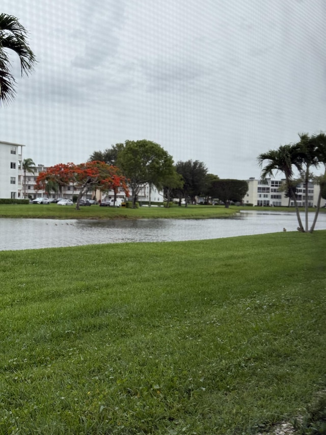 1046 Wolverton C, Boca Raton, FL 33434 - view of property's community with a water view and a yard