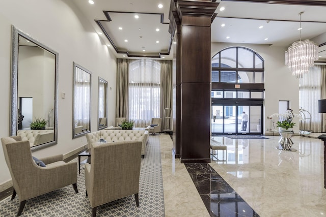 701 S Olive Ave Unit 714, West Palm Beach, FL 33401 - building lobby with a high ceiling and recessed lighting