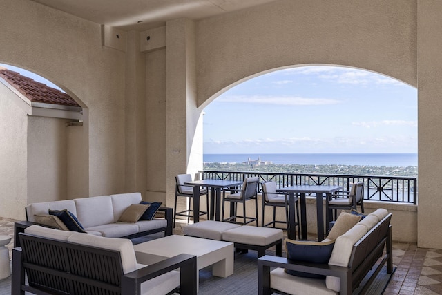 701 S Olive Ave Unit 714, West Palm Beach, FL 33401 - patio / terrace with an outdoor living space, a water view, and outdoor dining area