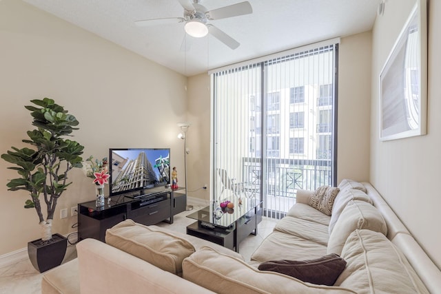 701 S Olive Ave Unit 714, West Palm Beach, FL 33401 - living room featuring a ceiling fan and tile patterned flooring