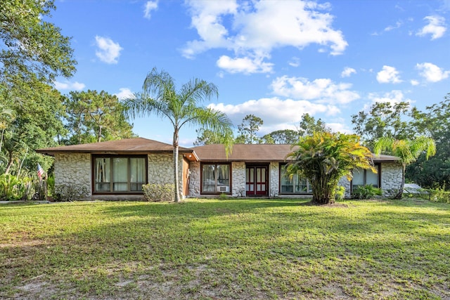 12401 174th Pl N, Jupiter, FL 33478 - view of front of house with stone siding and a front lawn