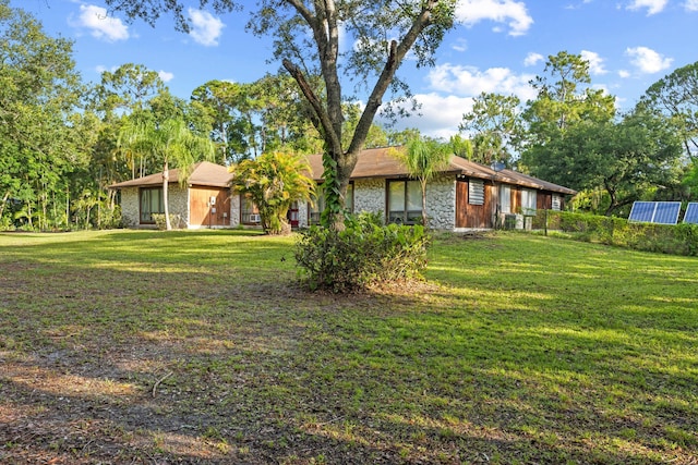 12401 174th Pl N, Jupiter, FL 33478 - view of front of property featuring stone siding