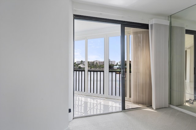 221 NE Plantation Rd Unit 303, Stuart, FL 34996 - entryway with carpet flooring
