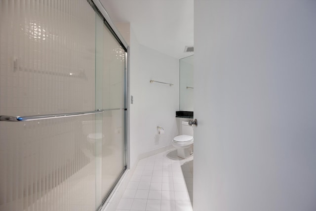 221 NE Plantation Rd Unit 303, Stuart, FL 34996 - bathroom featuring a shower stall and tile patterned flooring