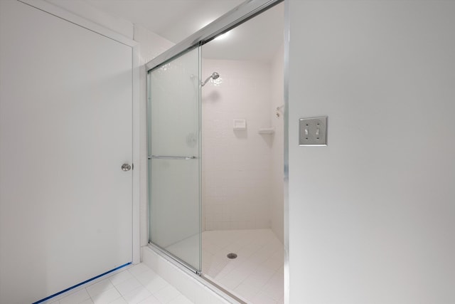 221 NE Plantation Rd Unit 303, Stuart, FL 34996 - full bathroom with a shower stall and tile patterned floors
