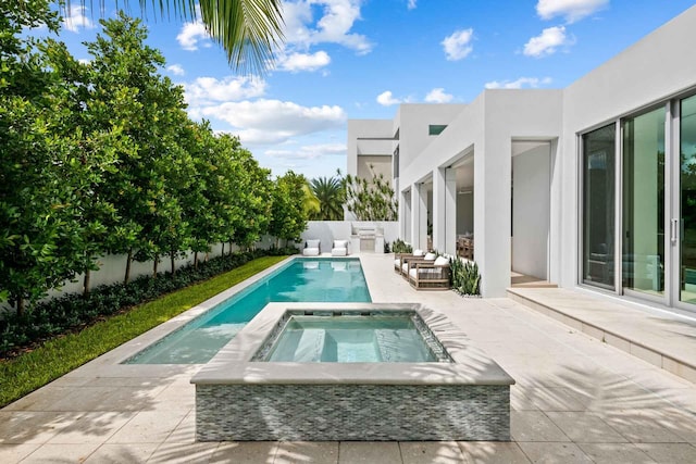1280 S Ocean Blvd Unit Share A, Delray Beach, FL 33483 - view of pool featuring an in-ground hot tub, a patio, and a fenced backyard