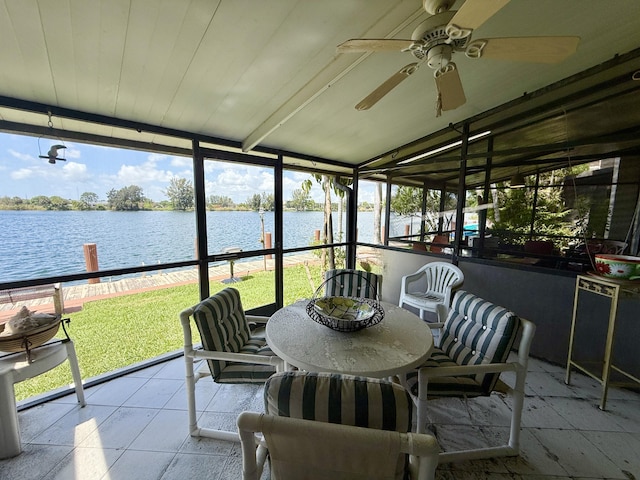 1100 Crystal Lake Dr Unit 107, Deerfield Beach, FL 33064 - sunroom / solarium featuring a water view, ceiling fan, plenty of natural light, and lofted ceiling